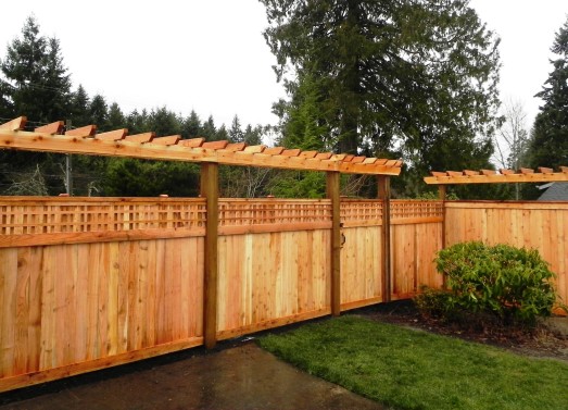 Wood fence with arbor Sublime Garden Design