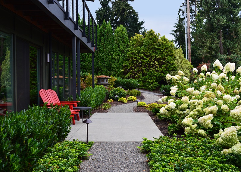 Medina Crushed Gravel Walkway With Concrete Patio And Hydrangeas By Sublime Garden Design