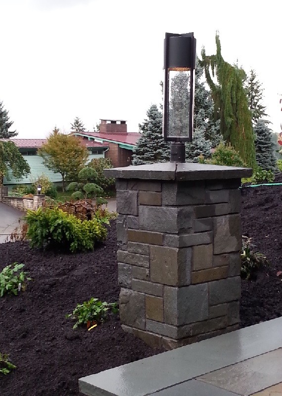 Snohomish bluestone entry pillar with light by Sublime Garden Design